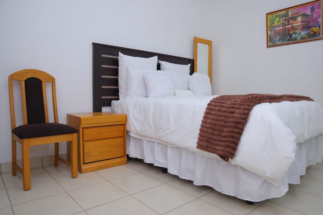Spacious suite with premium bedding